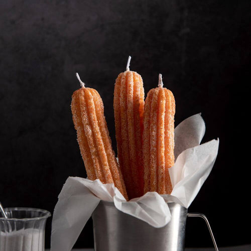 Experience the magical scent of churros at home with our Churros Taper Candle Set - a unique food candle inspired by Disneyland flavors