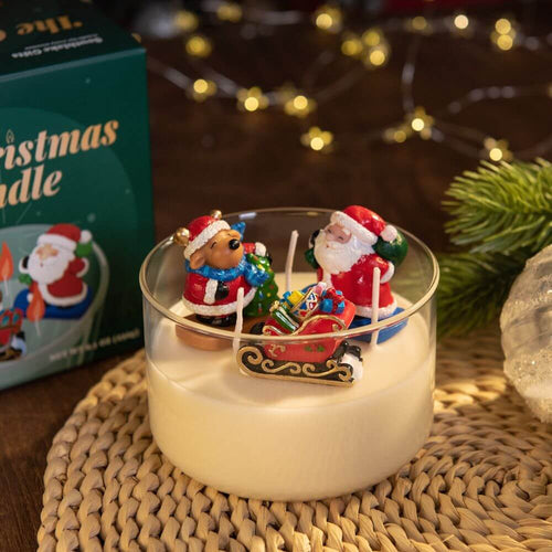 The Christmas Candle with it&#39;s packaging displayed in a decor setting