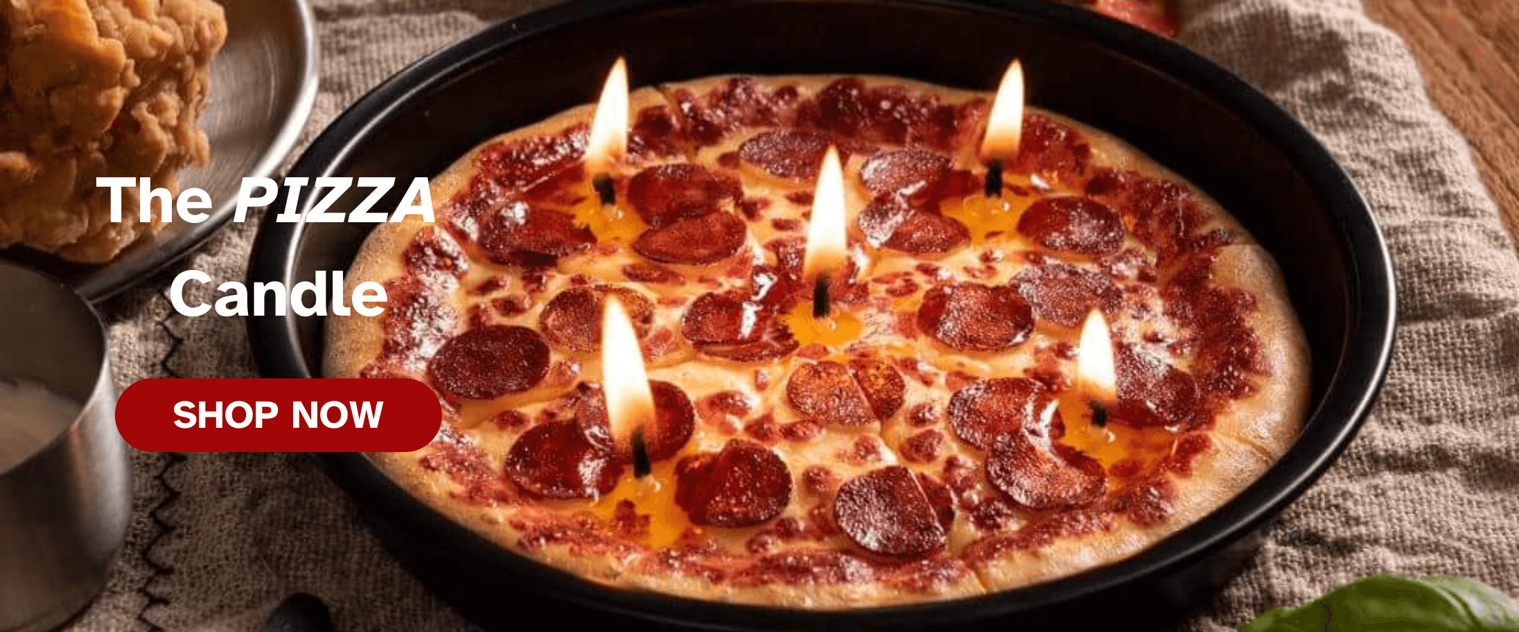 Pepperoni Pizza food Candle is lit up as home decoration candle display. 